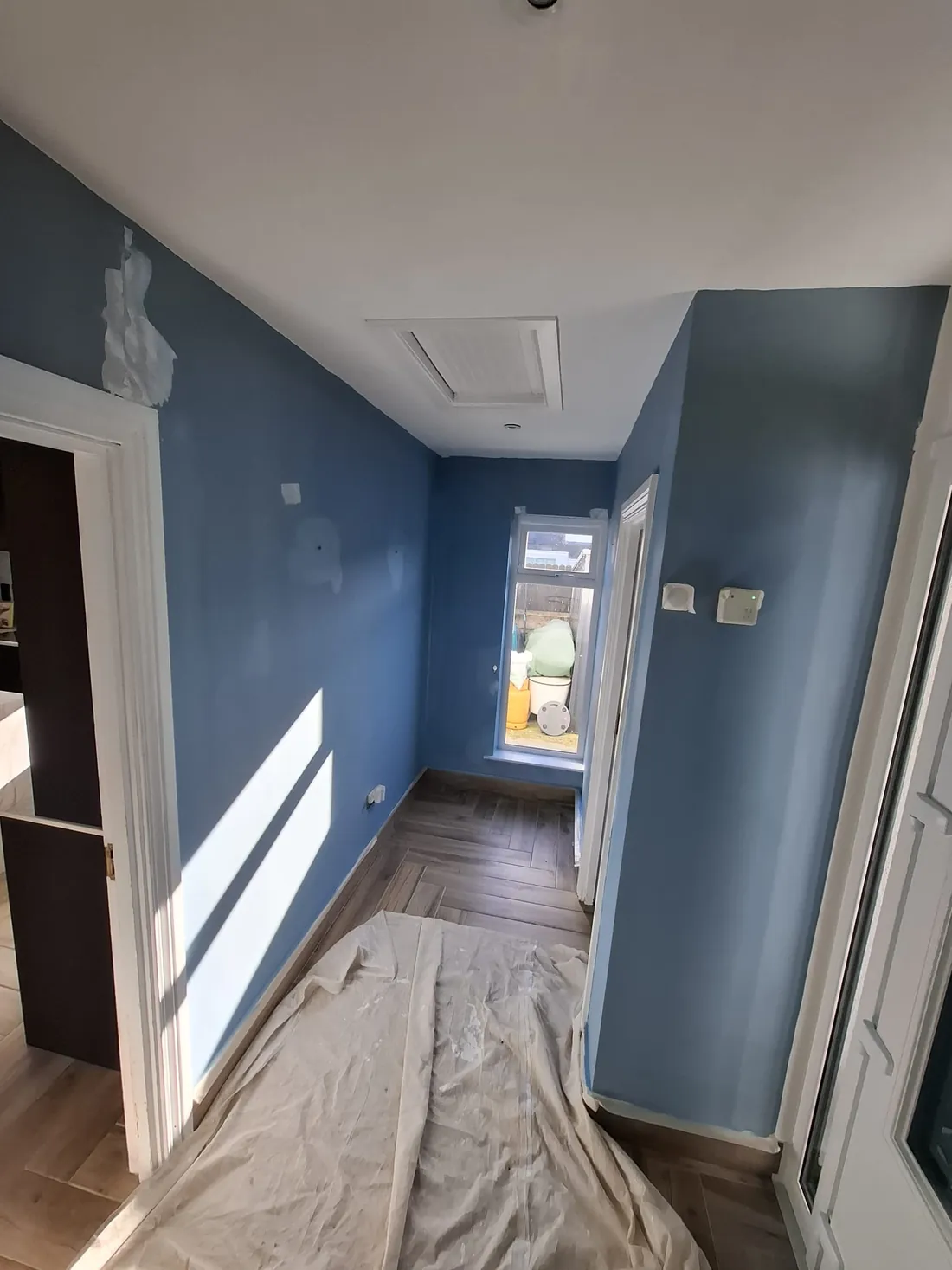 Blue-painted hallway in a Dublin home