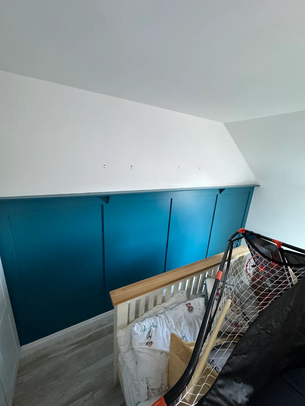 Freshly painted blue built-in wardrobe doors in a Dublin bedroom