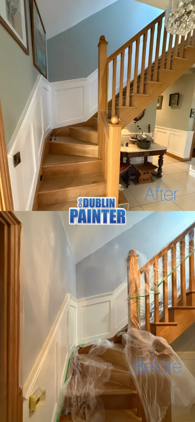 Oak staircase and white wainscoted hallway freshly painted in a Dublin home