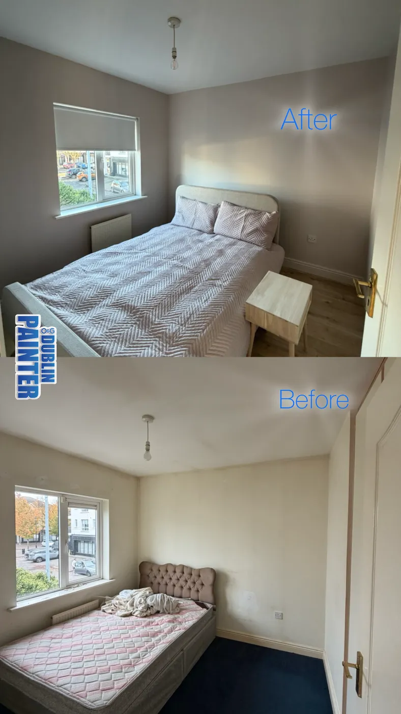 Freshly painted taupe bedroom with grey upholstered bed in a Dublin home